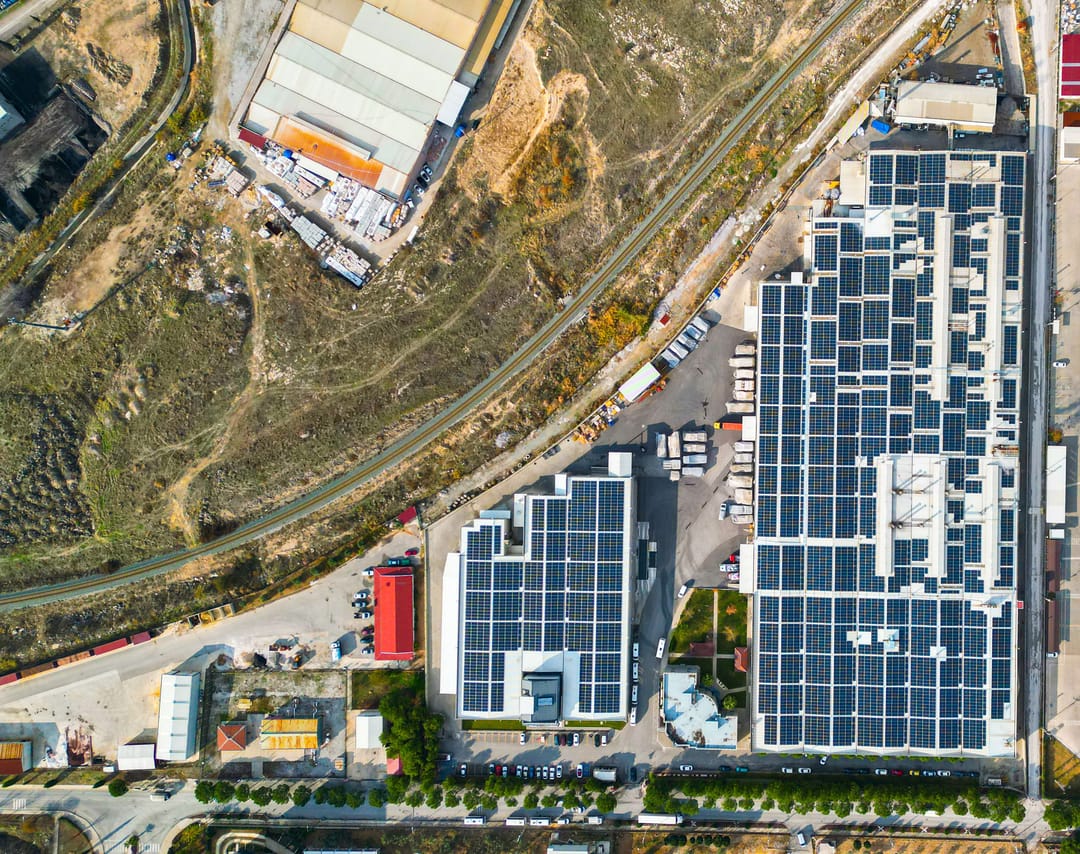 Aerial view of the manufacturing facility where capyhome textiles are made, its roofs covered in solar panels