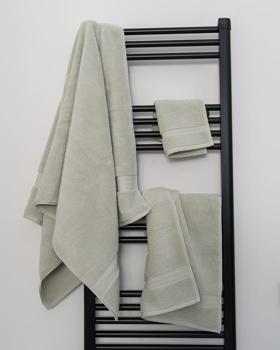 Sage Turkish cotton towels on a towel rail